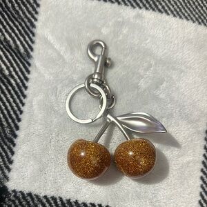 Gold Glittery Cherry Keychain with Silver Accents
